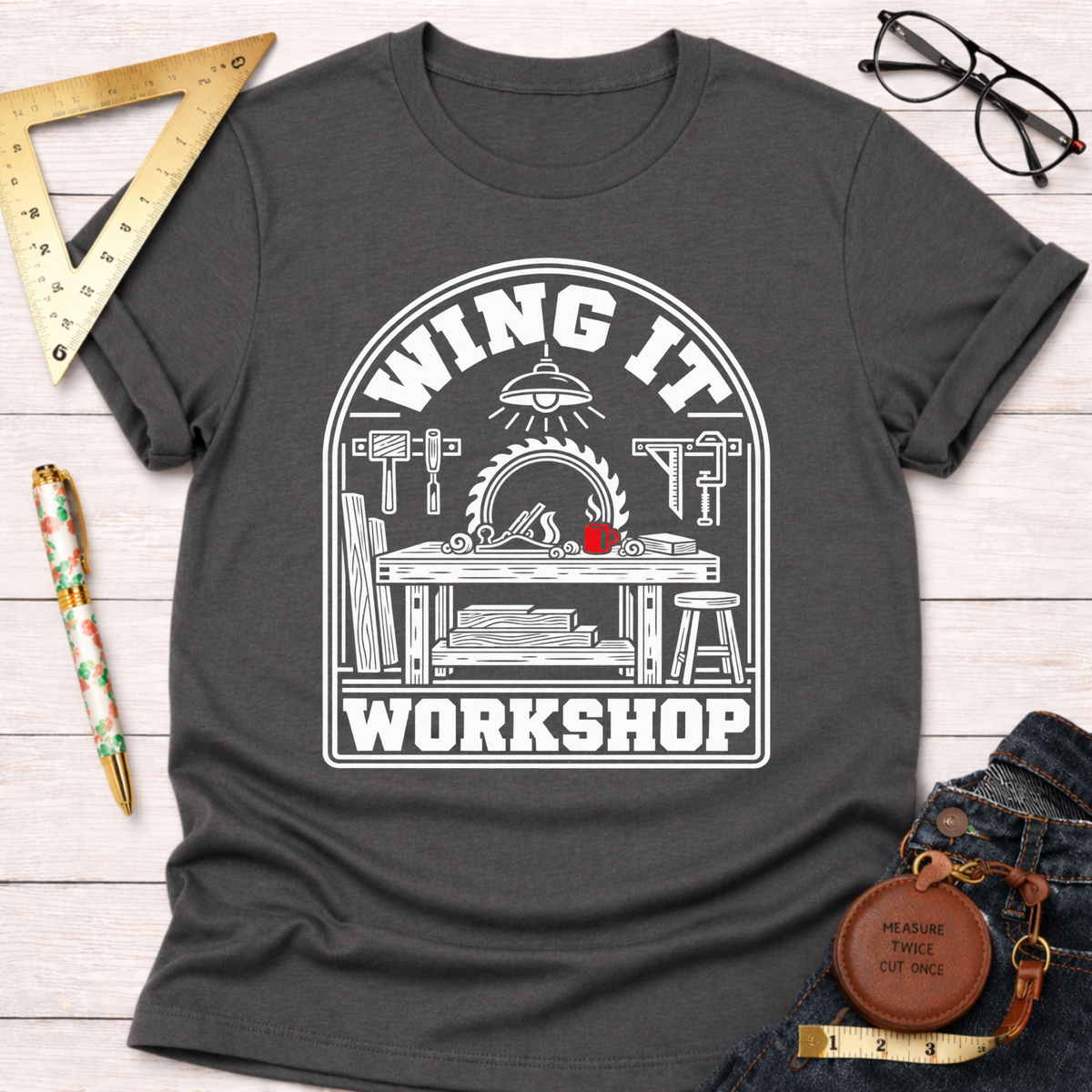 Winging It woodworking t-shirt, Wing It Workshop badge on asphalt gray – Sawdust & Ponytails (view 1)