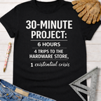 Women's funny woodworking graphic tee shirt for female woodworkers, makers, and DIY builders — Sawdust & Ponytails. Black cotton t-shirt with "30-MINUTE PROJECT: 6 HOURS, 4 TRIPS TO THE HARDWARE STORE, 1 existential crisis" text.