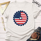 Cream t-shirt with a patriotic American flag saw blade graphic, surrounded by woodworking tools.