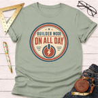 Light green cotton t-shirt with "Builder Mode On All Day" graphic, red and blue accents.