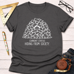 Dark gray cotton t-shirt with "Current Status: Hiding From Society" text and a woodpile graphic.