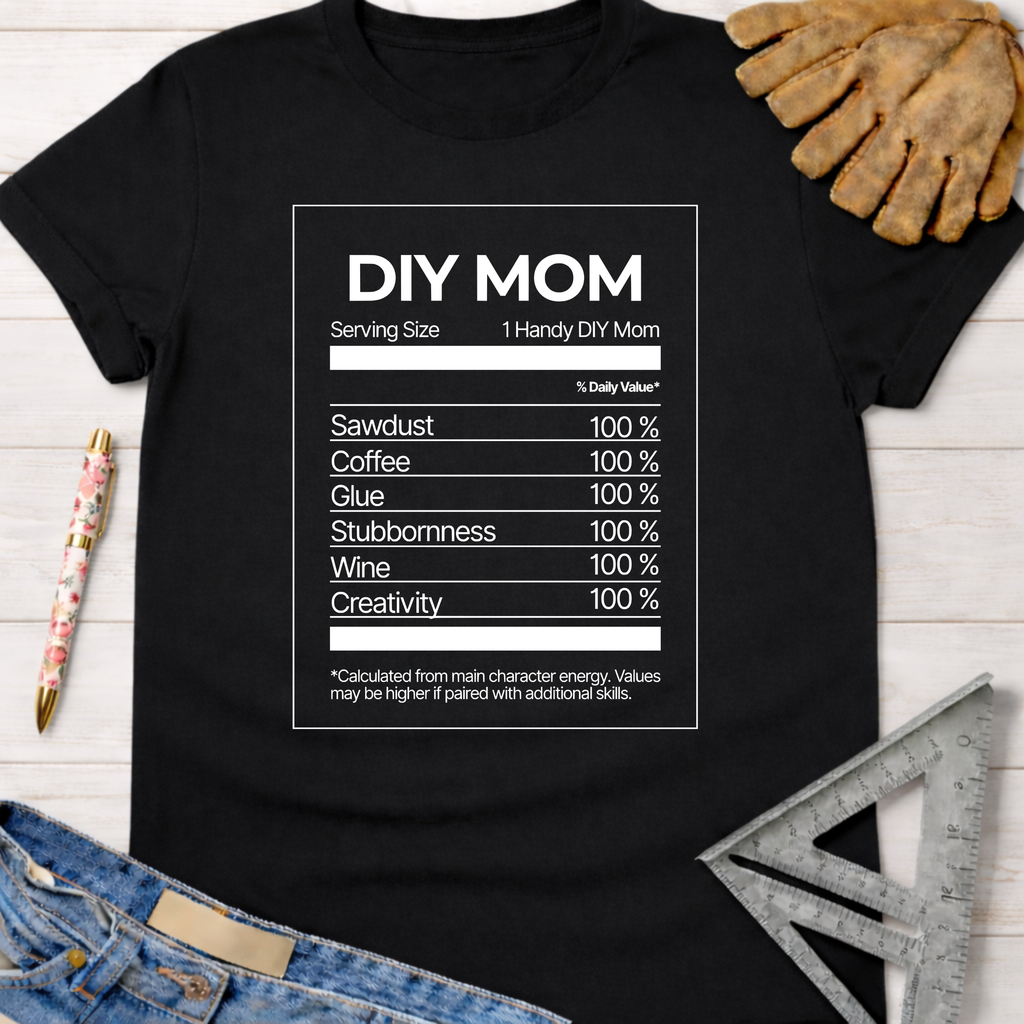 Black cotton "DIY Mom Nutrition Facts" graphic tee with white text, denim, and work gloves.