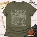 Olive green cotton t-shirt with "Those who say it cannot be done shouldn't interrupt the people doing it. I work alone" text and tool graphics.