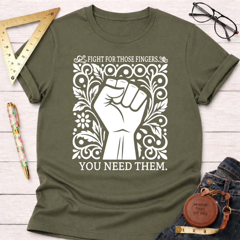Olive green cotton t-shirt with a white graphic of a raised fist surrounded by ornate floral designs and text.