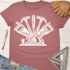 Women's funny woodworking graphic tee shirt for female woodworkers, makers, and DIY builders — Sawdust & Ponytails. Mauve cotton tee with white floral-patterned hammers, saws, and screwdriver design.