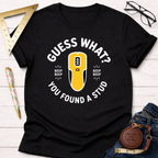 Black cotton t-shirt with "Guess What? You Found A Stud" text and a yellow stud finder graphic.