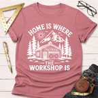 Women's funny woodworking graphic tee shirt for female woodworkers, makers, and DIY builders — Sawdust & Ponytails. Mauve cotton tee with "Home Is Where The Workshop Is" graphic.