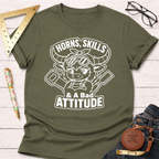 Olive green "Horns, Skills, & A Bad Attitude" t-shirt with a cartoon bull wearing goggles and holding tools.