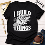 Black cotton "I Build Things" t-shirt with a white graphic beaver, ruler, glasses, and jeans.