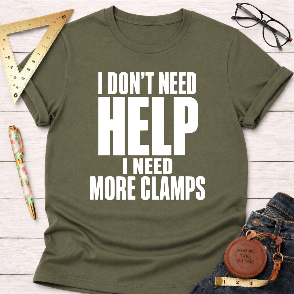 Olive green unisex t-shirt with "I Don't Need HELP I Need More CLAMPS" in white text.