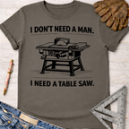 Women's funny woodworking graphic tee shirt for female woodworkers, makers, and DIY builders — Sawdust & Ponytails. Dark gray cotton t-shirt with "I DON'T NEED A MAN. I NEED A TABLE SAW." text and a table saw graphic.