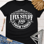 Black cotton "I Fix Stuff And I Know Things" graphic tee, with work gloves, jeans, and a ruler. Women's funny woodworking graphic tee shirt for female woodworkers, makers, and DIY builders — Sawdust & Ponytails