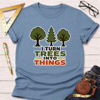 Light blue cotton t-shirt with "I Turn Trees Into Things" graphic and three tree illustrations.
