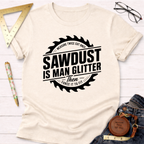 Cream "Sawdust Is Man Glitter" t-shirt with a saw blade graphic, styled with jeans and tools.