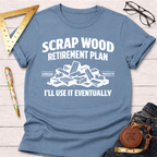 Light blue "Scrap Wood Retirement Plan" t-shirt with white text and a pile of wood scraps graphic.
