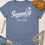 Women's funny woodworking graphic tee shirt for female woodworkers, makers, and DIY builders — Sawdust & Ponytails. Blue cotton tee with "Screwed it like a lady" graphic.