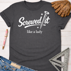 Women's funny woodworking graphic tee shirt for female woodworkers, makers, and DIY builders — Sawdust & Ponytails. Dark gray cotton tee with "Screwed It like a lady" graphic.