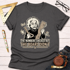 Charcoal gray t-shirt with a graphic of Einstein holding a ruler and wood, text reads "The numbers checked out, the board didn't.