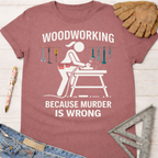 Women's funny woodworking graphic tee shirt for female woodworkers, makers, and DIY builders — Sawdust & Ponytails. Mauve short-sleeve t-shirt with a white graphic of a woman woodworking and text "WOODWORKING BECAUSE MURDER IS WRONG.
