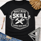 Black cotton "Built With Skill Women Who Make" graphic tee with hammer and saw design. Women's funny woodworking graphic tee shirt for female woodworkers, makers, and DIY builders — Sawdust & Ponytails