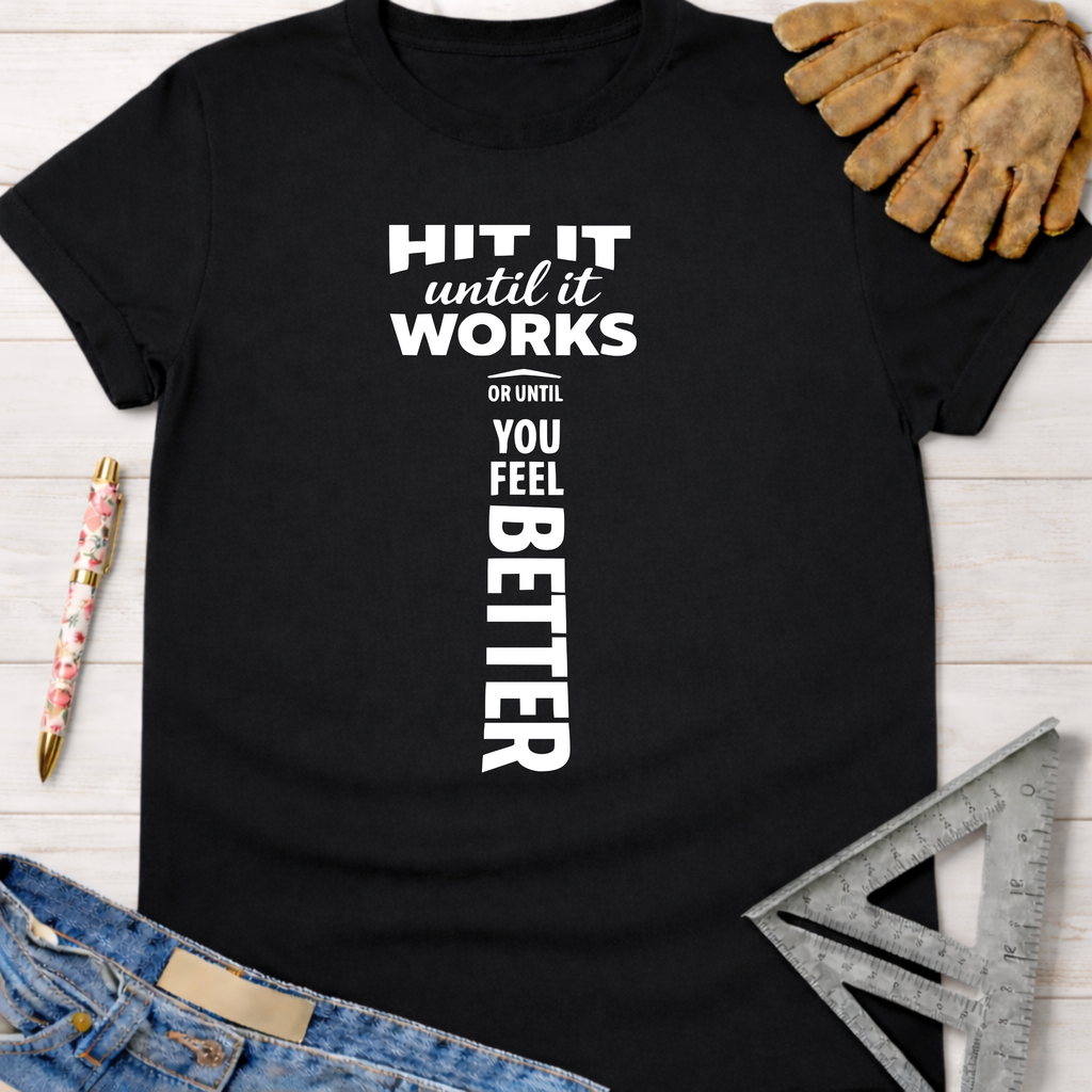 Black cotton t-shirt with "HIT IT until it works OR UNTIL YOU FEEL BETTER" text, work glove, and ruler. Women's funny woodworking graphic tee shirt for female woodworkers, makers, and DIY builders — Sawdust & Ponytails.