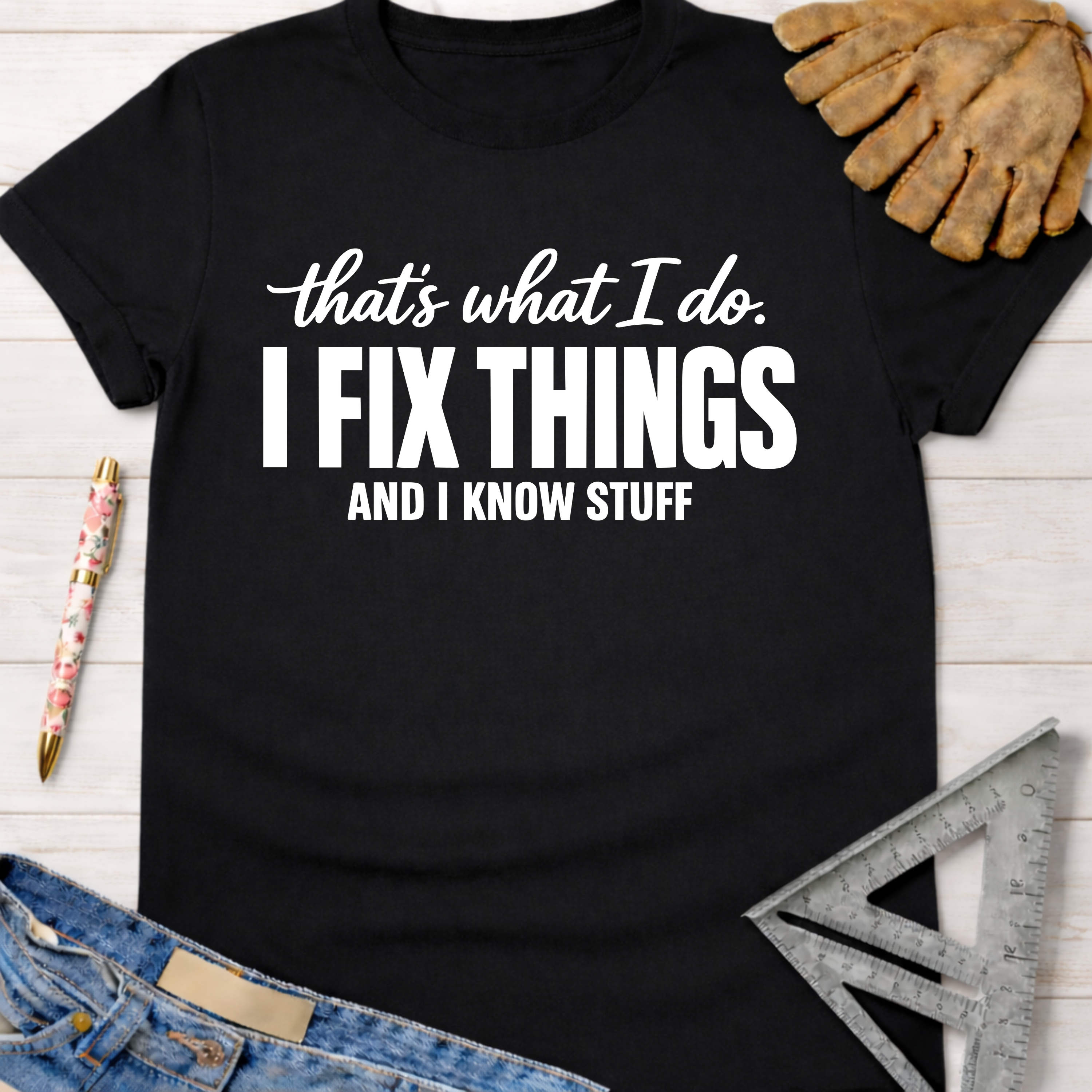 Women's funny woodworking graphic tee shirt for female woodworkers, makers, and DIY builders — Sawdust & Ponytails. Black cotton tee with "I FIX THINGS AND I KNOW STUFF" text.