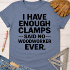 Women's funny woodworking graphic tee shirt for female woodworkers, makers, and DIY builders — Sawdust & Ponytails. Blue short-sleeve cotton t-shirt with "I HAVE ENOUGH CLAMPS — SAID NO — WOODWORKER EVER." in black text.