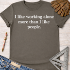 Women's funny woodworking graphic tee shirt for female woodworkers, makers, and DIY builders — Sawdust & Ponytails. Dark gray cotton tee with "I like working alone more than I like people" text.