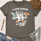 Women's funny woodworking graphic tee shirt for female woodworkers, makers, and DIY builders — Sawdust & Ponytails. Charcoal gray cotton tee with "I Love Coffee and DIY" text and a coffee cup character holding a drill and paint roller.