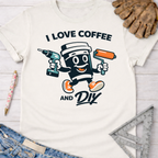 Women's funny woodworking graphic tee shirt for female woodworkers, makers, and DIY builders — Sawdust & Ponytails. White cotton tee with a cartoon coffee cup holding a drill and paint roller.