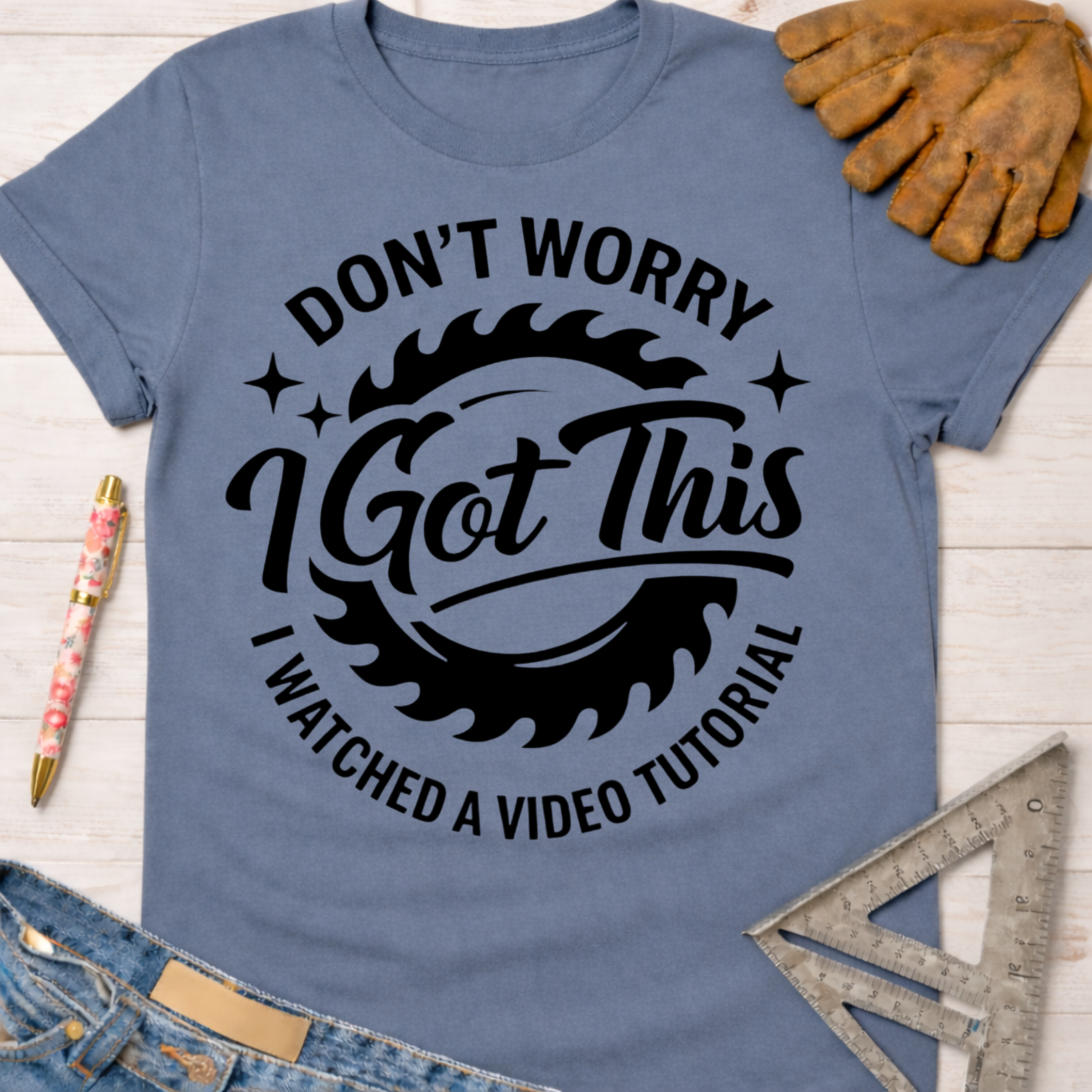 Women's funny woodworking graphic tee shirt for female woodworkers, makers, and DIY builders — Sawdust & Ponytails. Blue short-sleeve t-shirt with "Don't Worry I Got This I Watched A Video Tutorial" text.