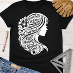 Women's funny woodworking graphic tee shirt for female woodworkers, makers, and DIY builders — Sawdust & Ponytails. Black cotton tee with white graphic of a woman's profile, hair filled with tools and text: "Measure Twice Cut Once Handmade Crafted Built Not Bought Sawdust & Soul.