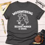 Charcoal gray women's funny woodworking graphic tee with a unicorn holding a hammer and "Woodworking Because Murder Is Wrong" text.