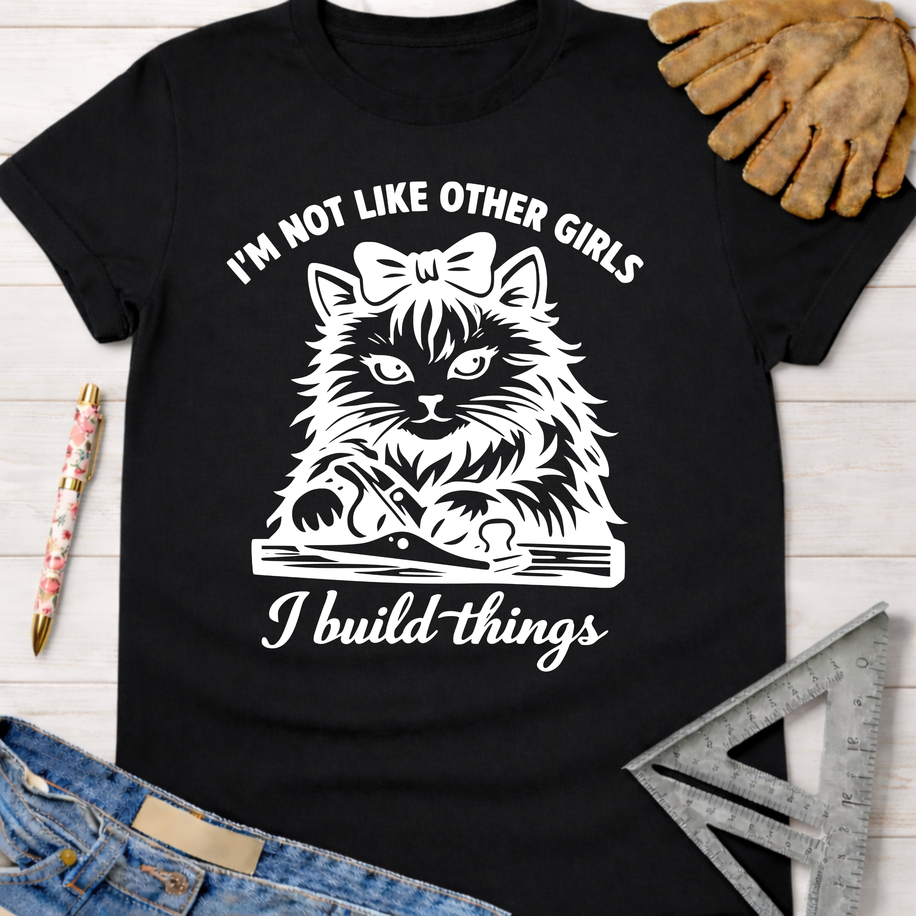 Black cotton Women's funny woodworking graphic tee shirt with a fluffy cat, bow, and hand plane design.