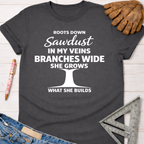 Charcoal gray Roots Down T-shirt with white "Sawdust in My Veins" graphic, women's funny woodworking tee.