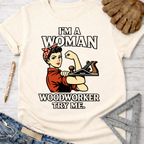 Cream "I'm A Woman Woodworker Try Me" Rosie the Riveter graphic tee for female woodworkers.
