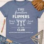 Women's funny woodworking graphic tee shirt for female woodworkers, makers, and DIY builders — Sawdust & Ponytails. Blue cotton tee with "The Furniture Flippers Social Club" design.