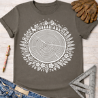 Women's funny woodworking graphic tee shirt for female woodworkers, makers, and DIY builders — Sawdust & Ponytails. Dark gray t-shirt with a white tree ring of life design, surrounded by deer, mountains, mushrooms, and foliage.