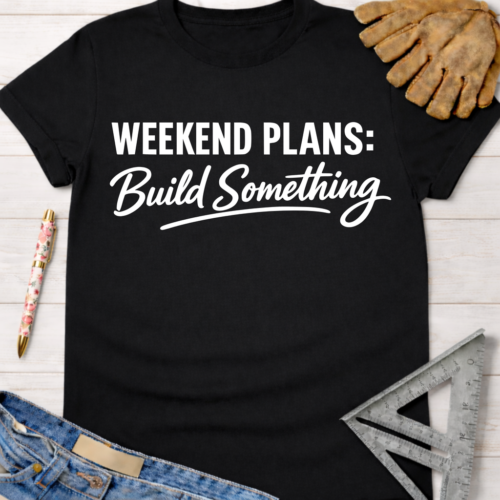 Black cotton "Weekend Plans: Build Something" tee with work glove, pen, ruler, and jeans.