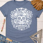 Blue "Workshop Queen" floral skull tee with tools, owl, and "Sawdust & Ponytails" for female woodworkers.