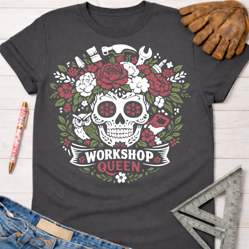 Charcoal gray women's funny woodworking graphic tee shirt for female woodworkers, makers, and DIY builders — Sawdust & Ponytails, featuring a floral skull design with tools and "Workshop Queen" text.