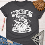 Charcoal grey women's "Workshop Queen Retro Collection" graphic tee with a vintage female woodworker holding a drill. Women's funny woodworking graphic tee shirt for female woodworkers, makers, and DIY builders — Sawdust & Ponytails